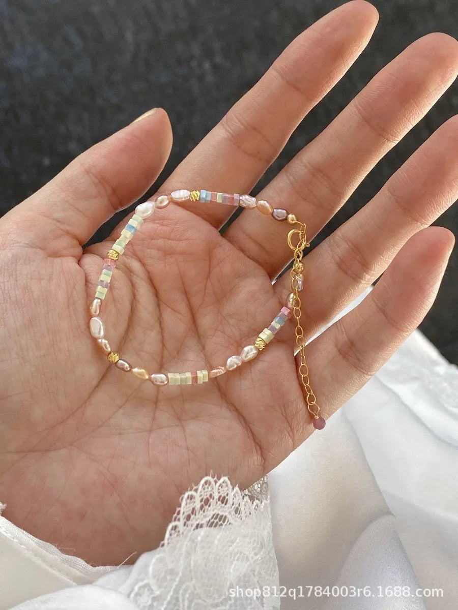 Women's natural pearl bracelet and necklace set with 14K gold gilding and silver accents