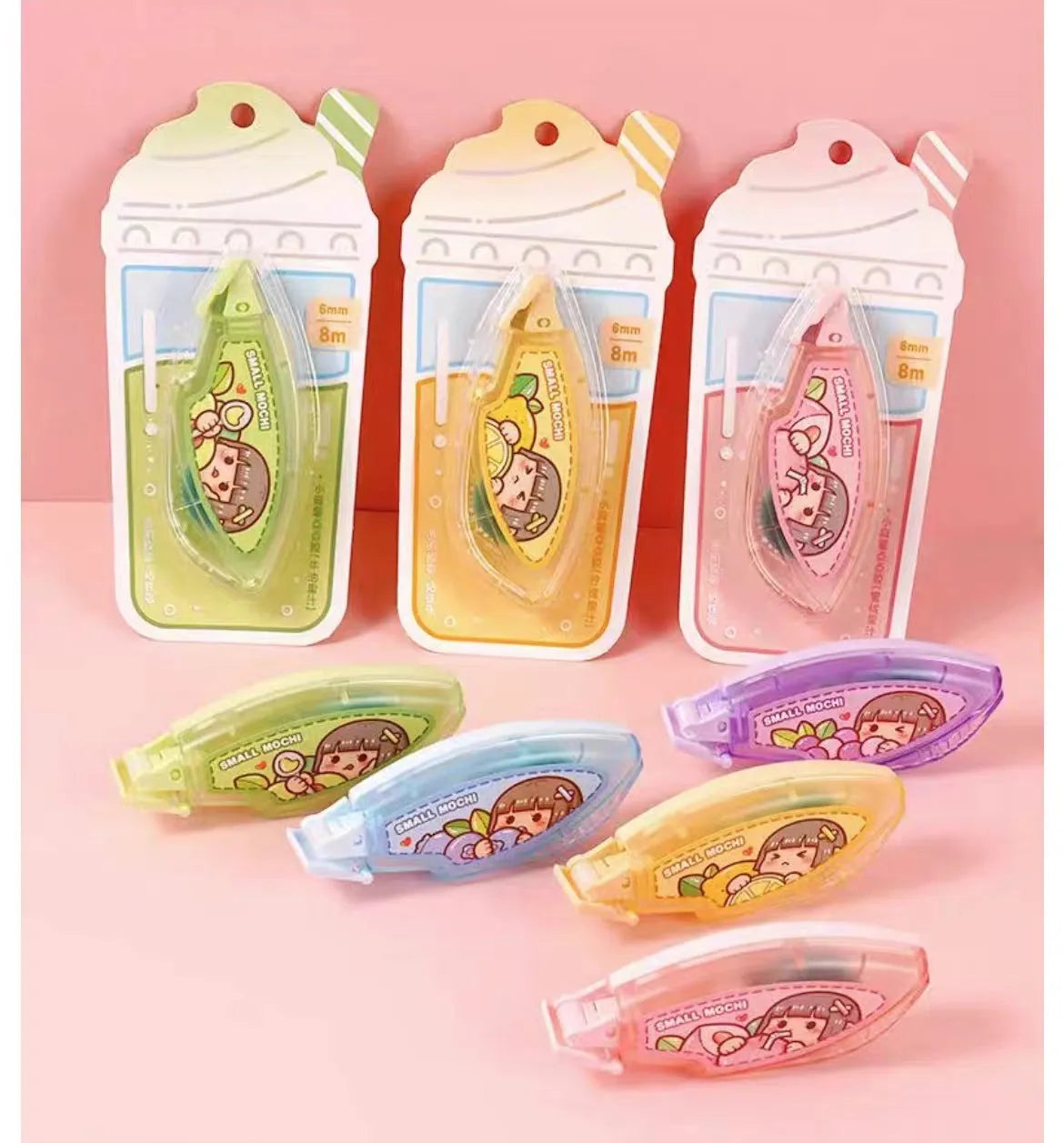 Card of colourful dotting glue double-sided adhesive dots in peach, lemon, blueberry, butter, and grape juice colours.