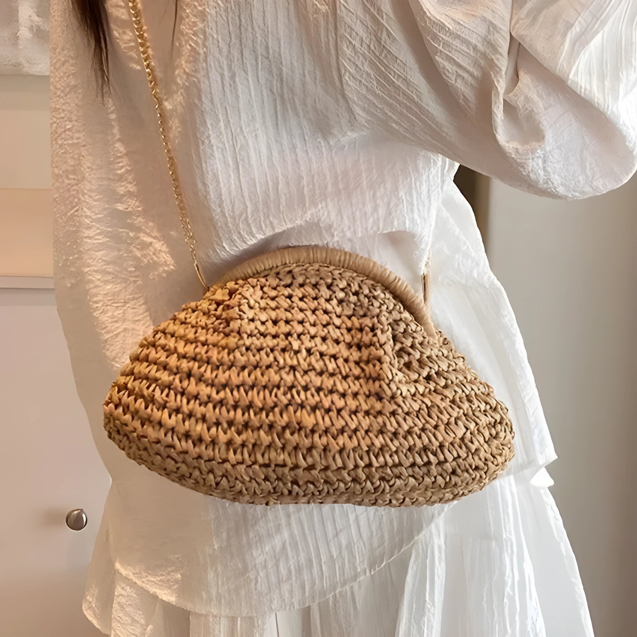 Women's woven paper straw beach bag with shoulder chain in khaki colour showing interior zip pocket