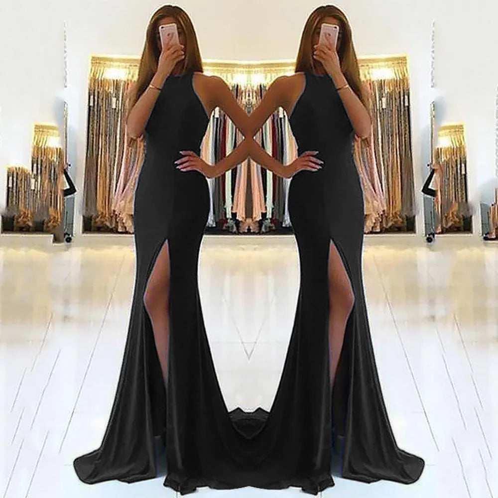 Red long evening dress with a high waist, hollow details, and a flowing large swing skirt.