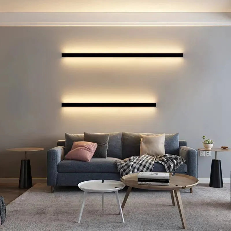 Black 80cm long aluminium LED strip wall lamp mounted on a wall, demonstrating three colour light options.