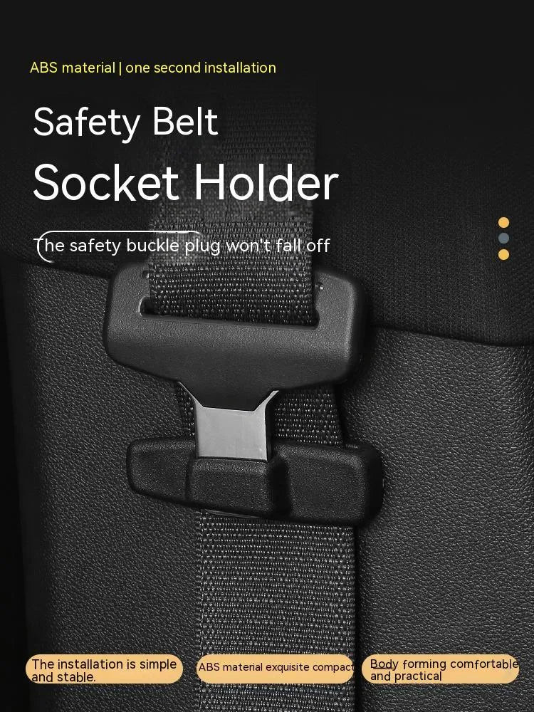 Two black plastic car safety belt clips for adjustable seat belt tension.
