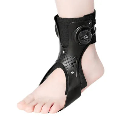 Grey adjustable ankle support brace with airbag button, shown on a left foot.