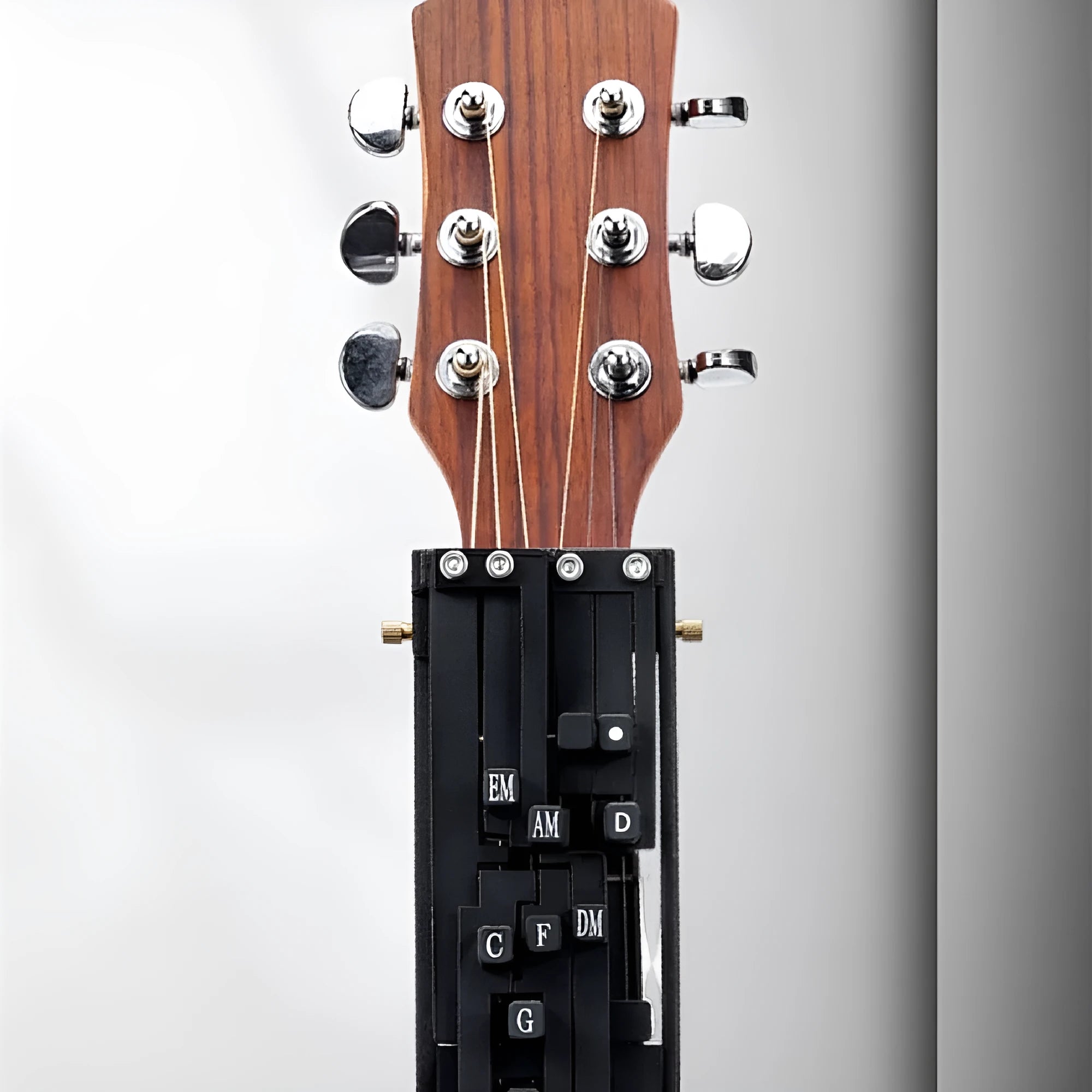 Black automatic guitar chord device for folk playing practice with double chord functionality