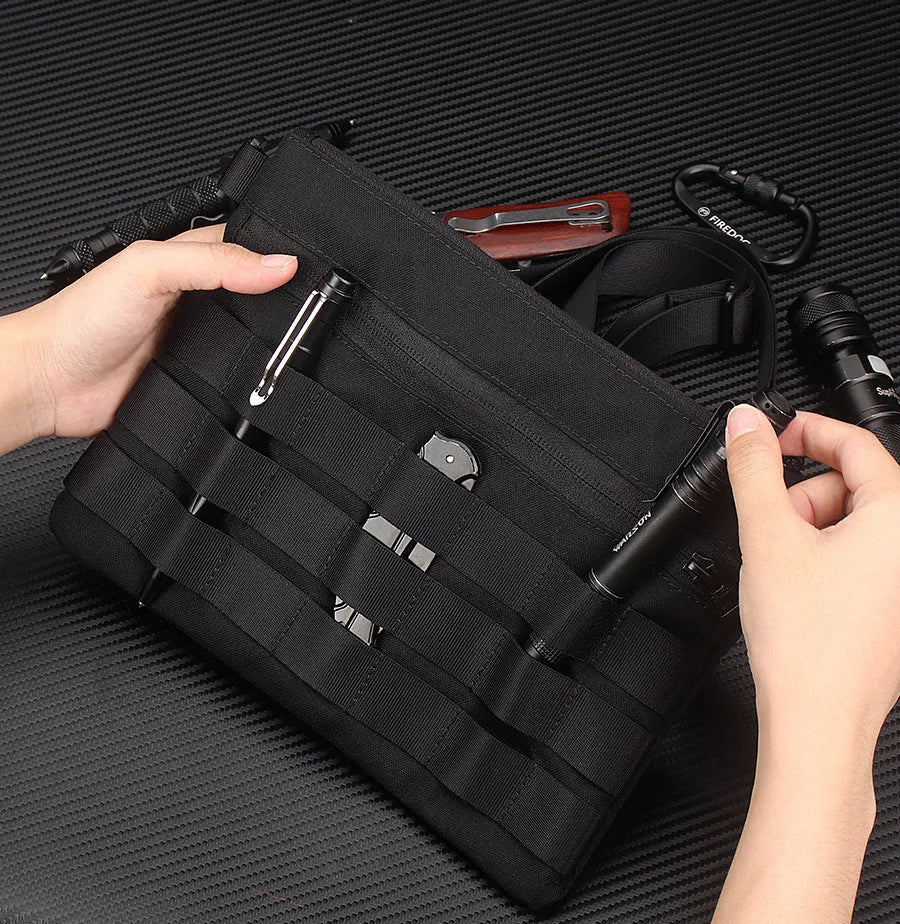 Black Oxford cloth portable outdoor organiser kit measuring 18cm by 3.5cm