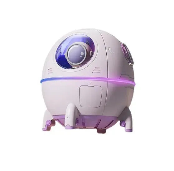 Light purple astronaut-shaped USB humidifier with 220ml tank and colourful LED light on desktop