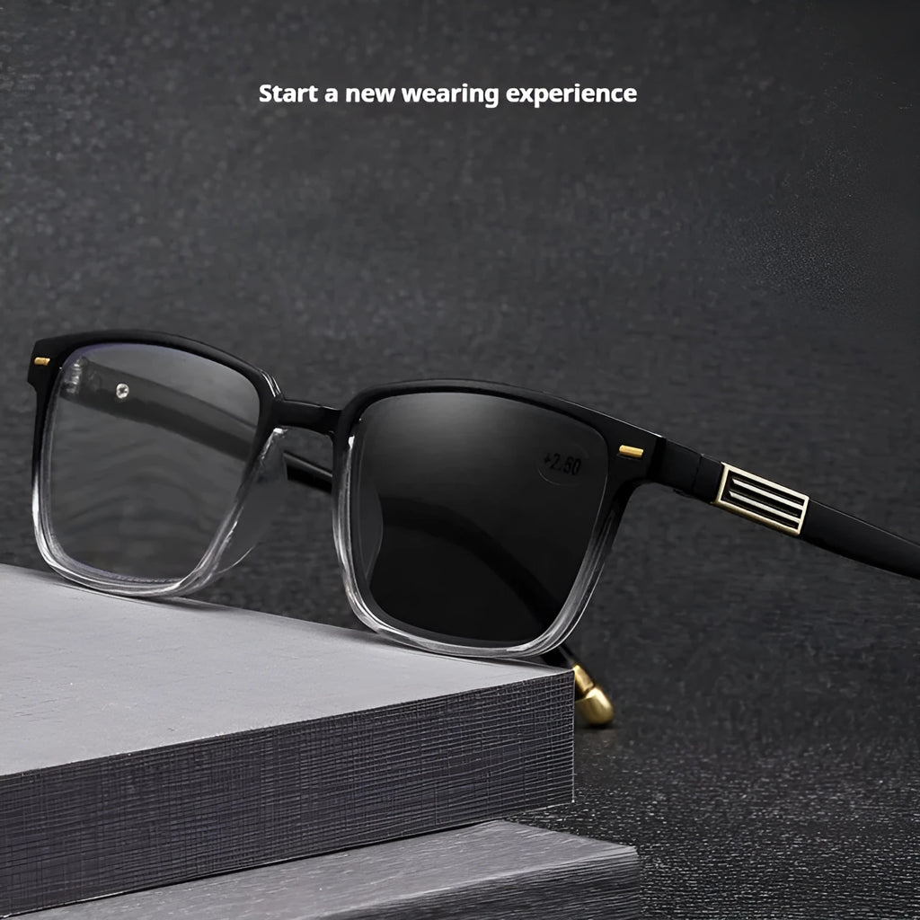 Multifocal reading glasses with anti blue light and colour changing lenses in a black and silver frame.