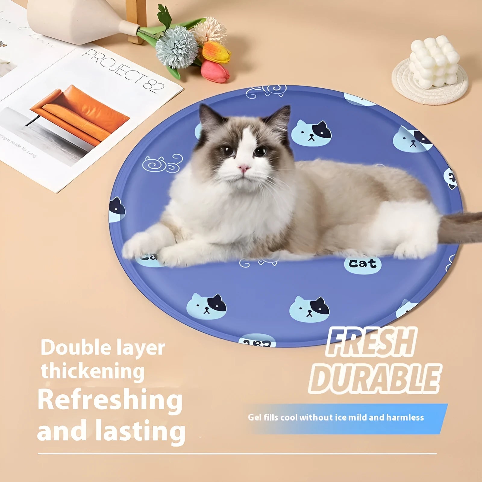 Round blue pet cooling mat with cartoon polar bear print for dogs.