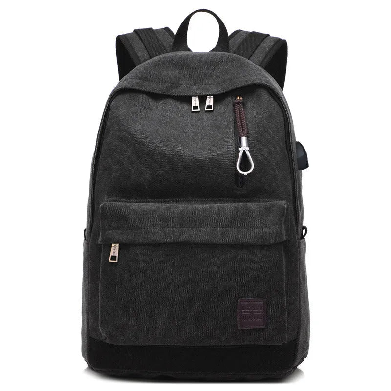 Canvas USB charging backpack in khaki colour showing front compartment and USB port.