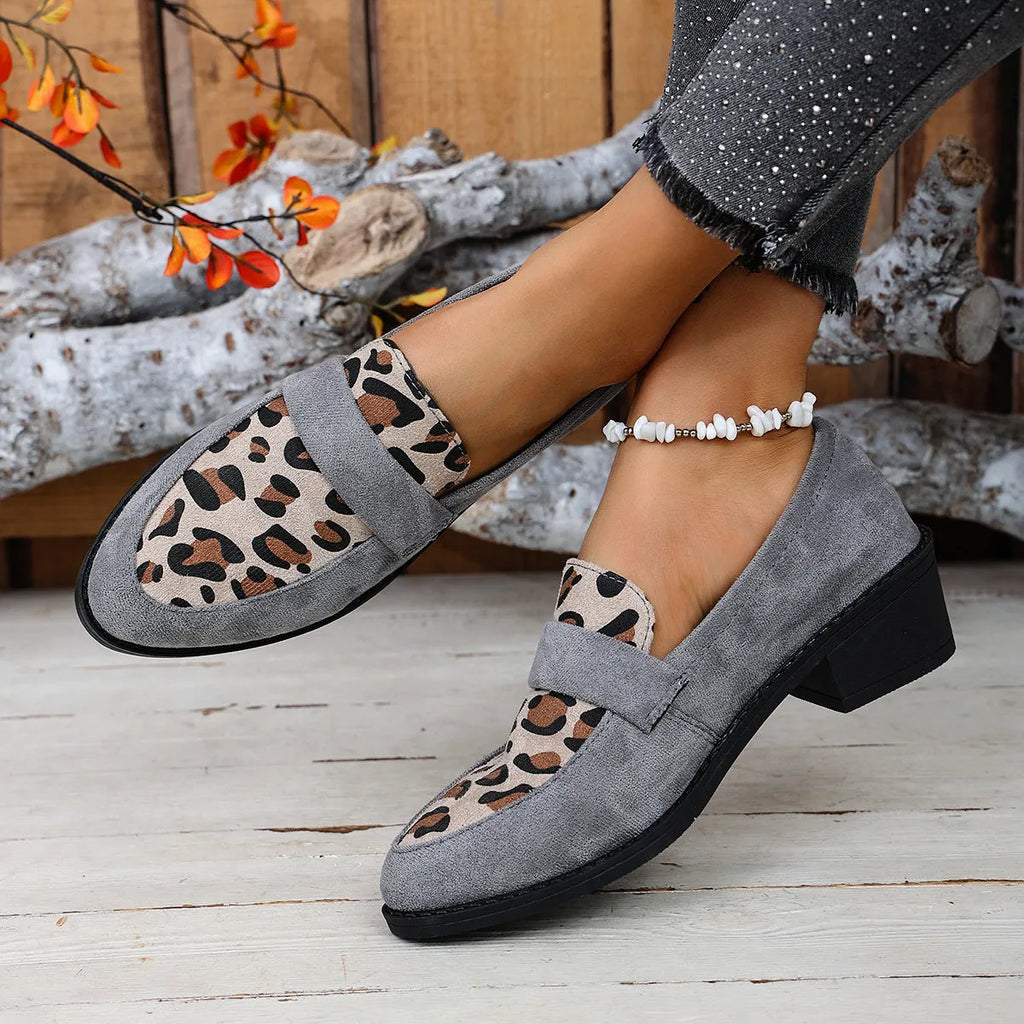 Leopard print suede slip-on shoe with a chunky mid-heel and pointed toe in pink