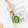 Green watermelon-shaped zinc alloy keychain with fruit diamond design measuring 12cm