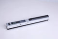 Handheld plastic scanner shown in black, blue, green, red, and silver colour options.