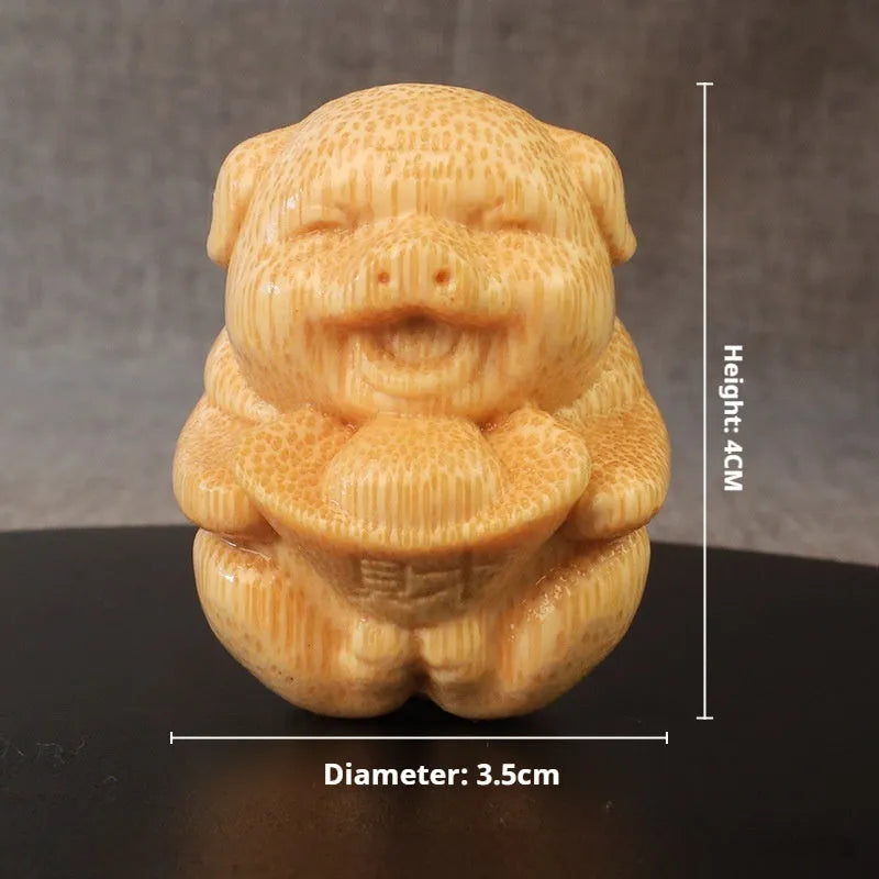 Small solid bamboo carving ornament in the shape of a cute pig ingot, 4cm height, natural wood colour