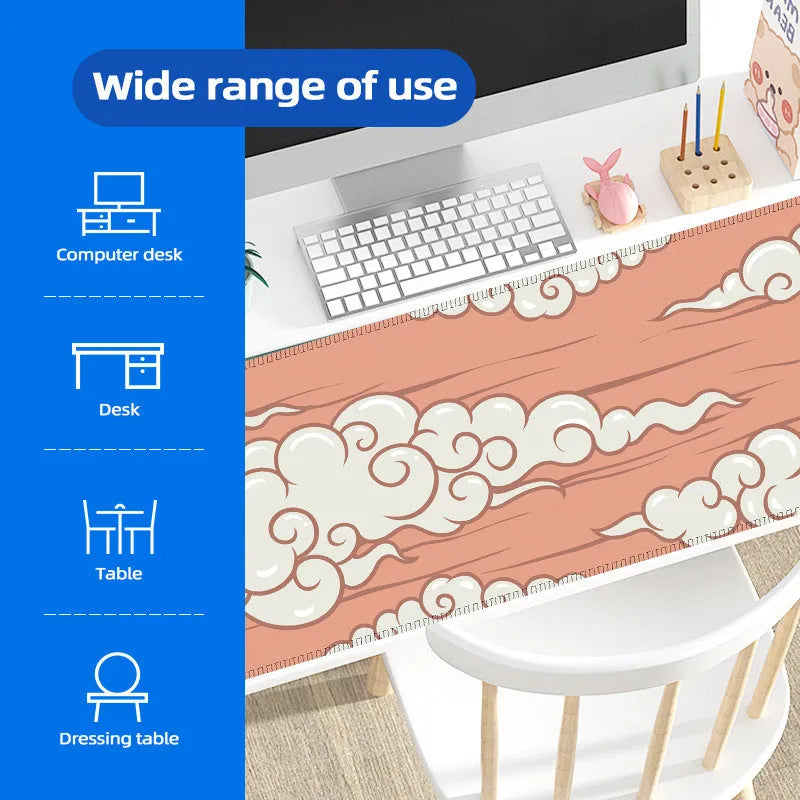 Large rectangular cloud pattern mouse pad and desk mat in natural rubber on a wooden desk.