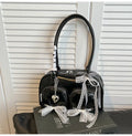 Large capacity soft PU leather shoulder bag in beige with crossbody straps and interior phone pocket