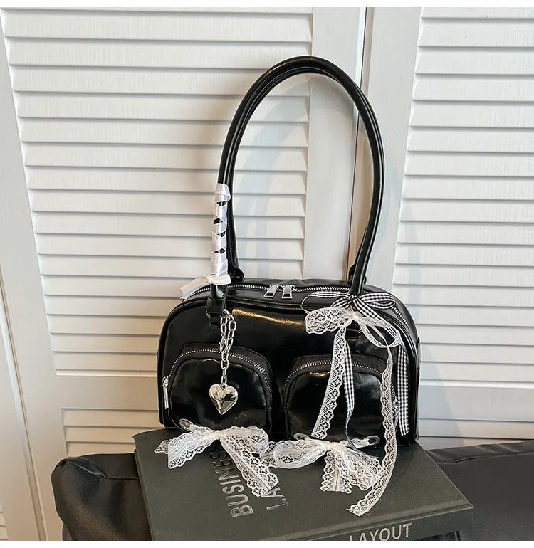 Large capacity soft PU leather shoulder bag in beige with crossbody straps and interior phone pocket