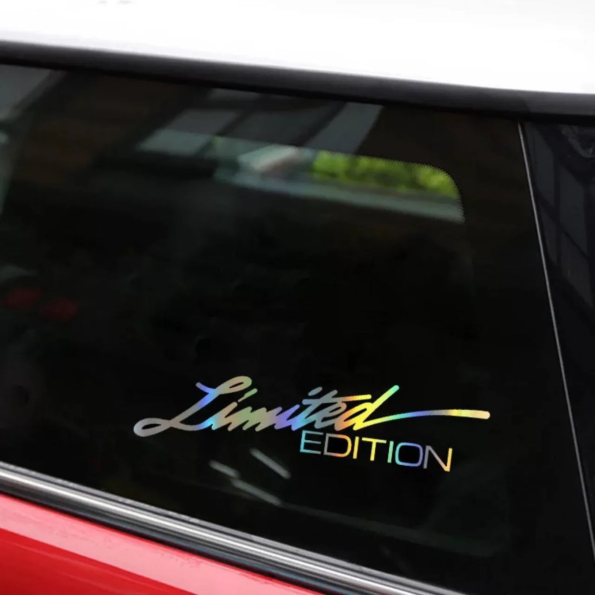 Black laser reflective text-style car sticker on vehicle window