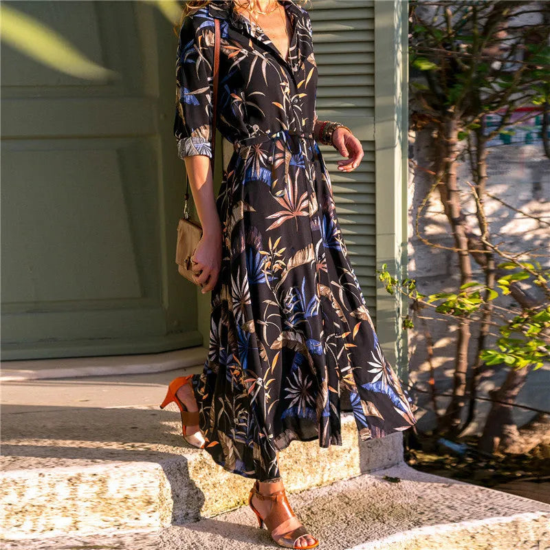 Women's vintage-inspired chiffon summer dress with V-neck and printed A-line skirt.