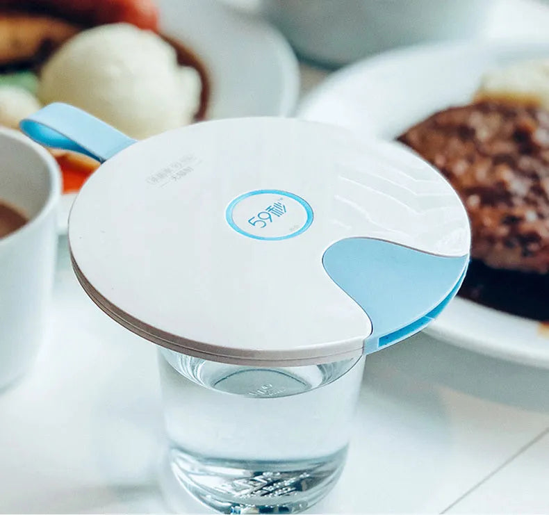 A slim, portable UV baby bottle steriliser in blue, showing its compact size and USB charging port.