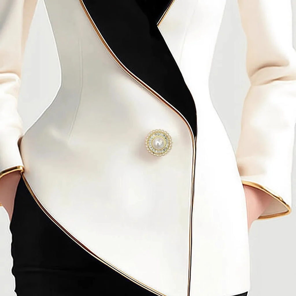 Milky white women's long sleeve coat with golden edge detailing and pearl buttons, irregular cut design