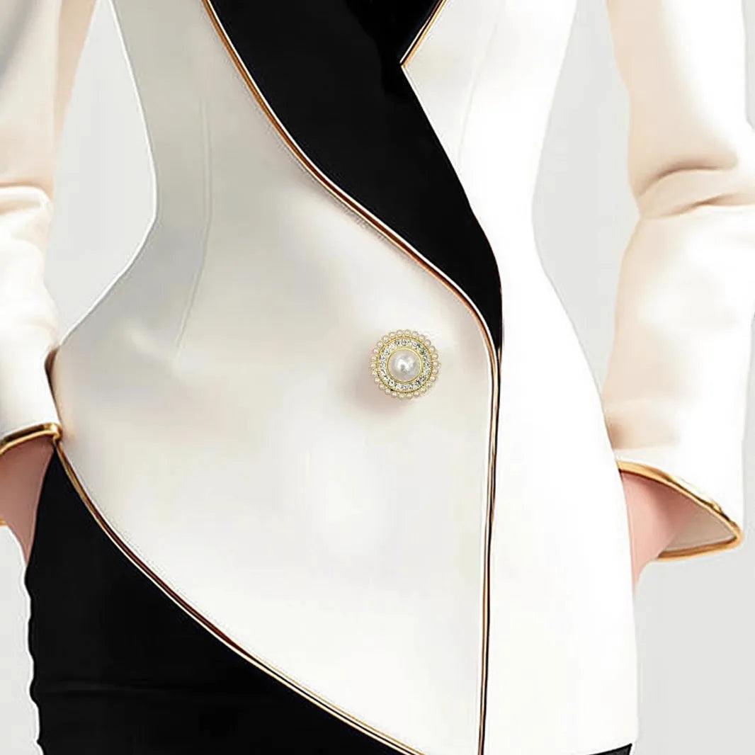 Milky white women's long sleeve coat with golden edge detailing and pearl buttons, irregular cut design
