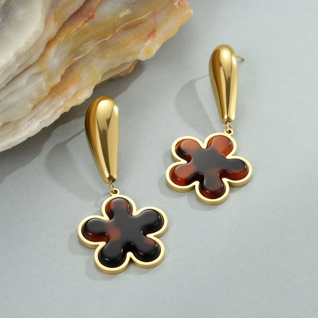 Pair of 18K gold plated stainless steel earrings featuring tortoiseshell resin in heart and flower geometric shapes for women