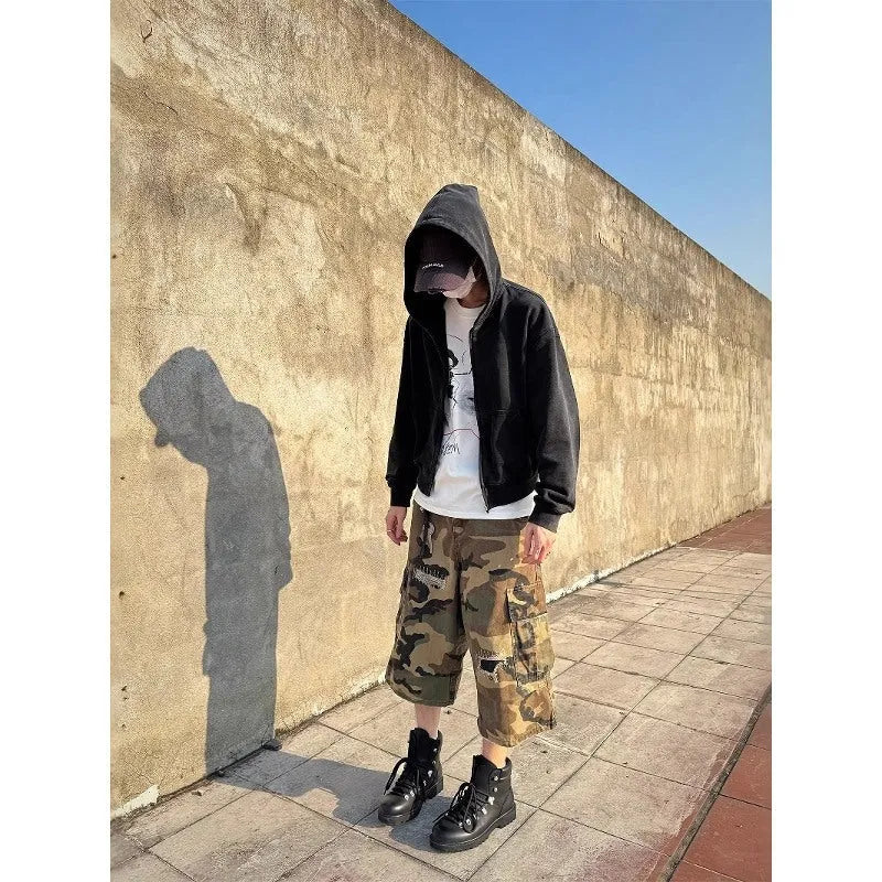 Men's camouflage cropped jeans with ripped detailing and loose straight leg fit