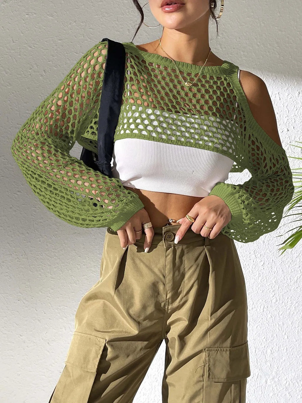 Mesh shirt with navel hollowed design for beachwear in polypropylene fabric, shown in multiple colours.