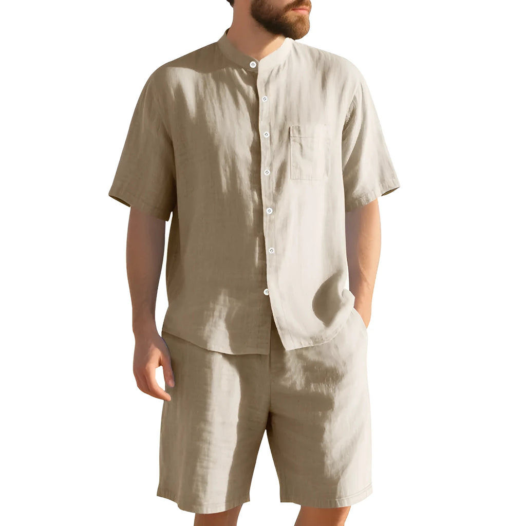 Men's light blue linen two-piece suit with short sleeve jacket and shorts on a hanger.