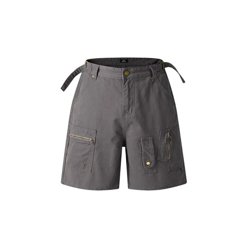 Retro loose-fit workwear shorts in washed cotton fabric with a zipper fly, shown in grey colour.