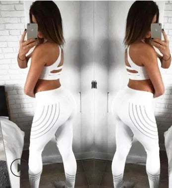 Women's black fitness leggings with reflective print pattern for night workouts