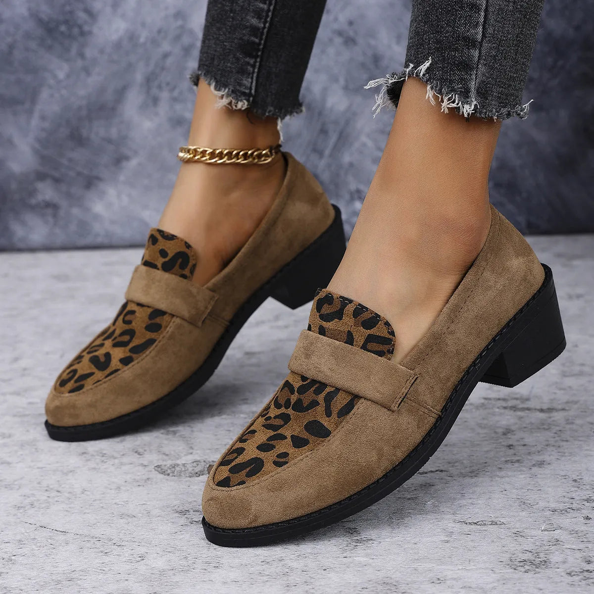 Leopard print suede slip-on shoe with a chunky mid-heel and pointed toe in pink