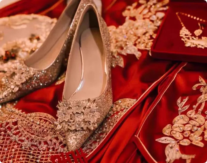 Champagne coloured women's wedding high heel shoes with crystal decoration and a pointed toe.