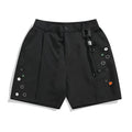 Man's black loose-fitting semi-elastic casual shorts with straight leg.