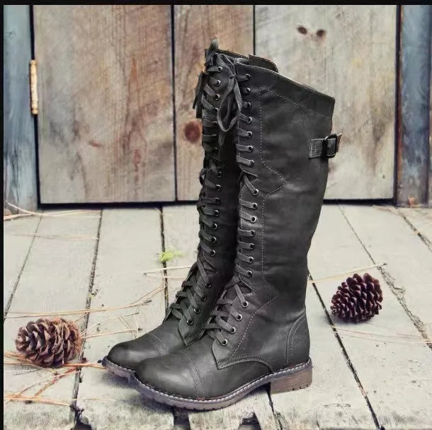 Women's chunky heel high leg boot in solid colour with round toe and low heel design