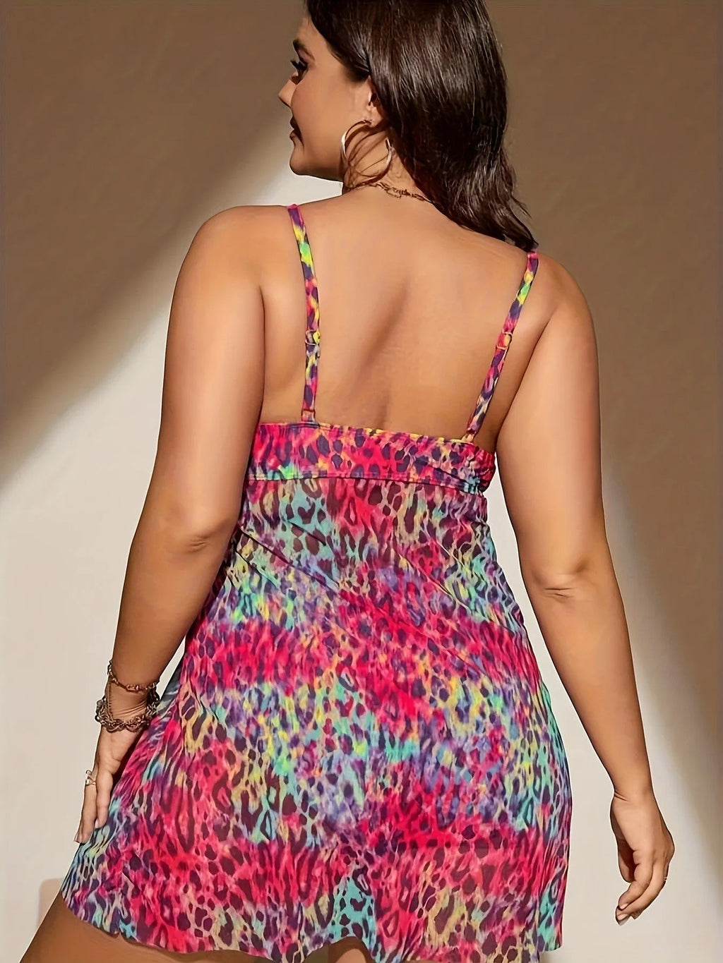 Plus size women's bikini set with a sleeveless top and a split skirt in a choice of colours.