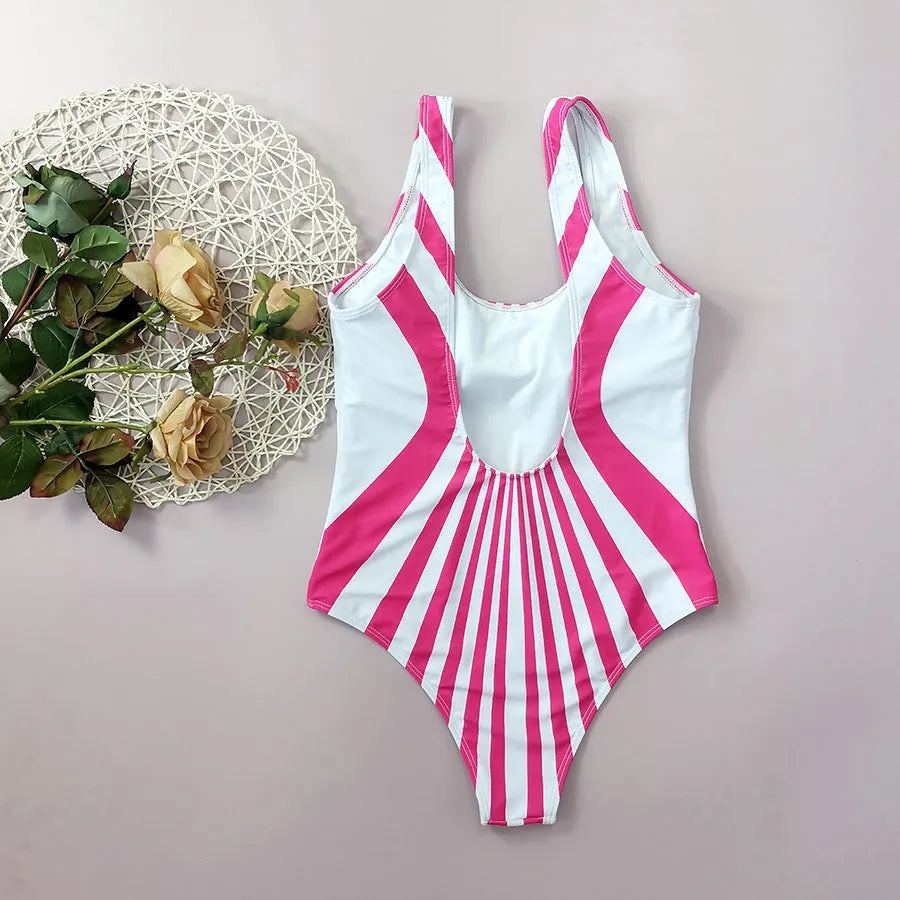 Women's pink striped one-piece swimsuit with digital printing on front and back.