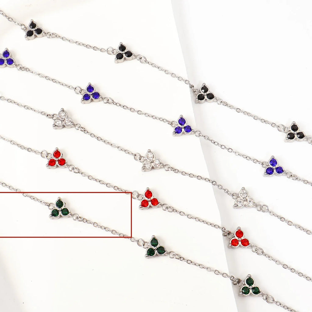 Women's geometric stainless steel bracelet with three-diamond triangle design and zircon stones