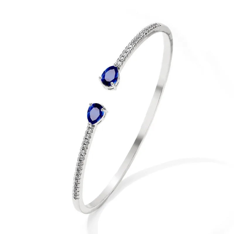 Personalised copper bracelet with multi-zircon inlay in white or blue colour option.