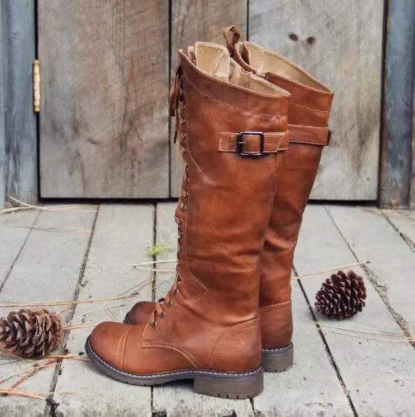 Women's chunky heel high leg boot in solid colour with round toe and low heel design