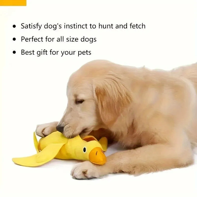 Yellow plush teddy dog toy with attached duck doll and food leak compartments for pet training