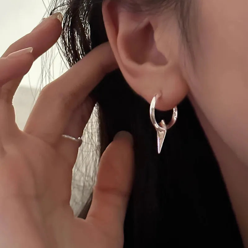 Geometric star-shaped ear clips for women with electroplated platinum finish on copper