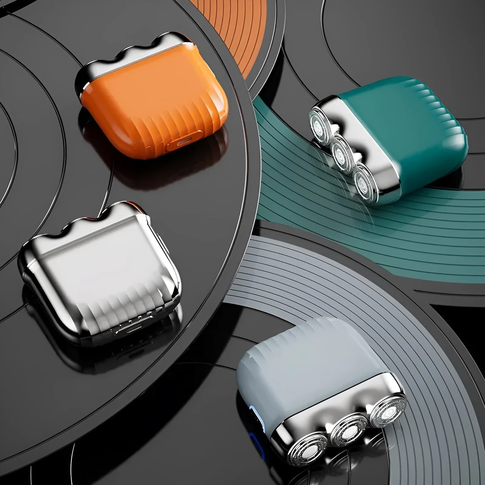 Three-head mini electric shaver in gun colour with rechargeable battery and magnetic heads