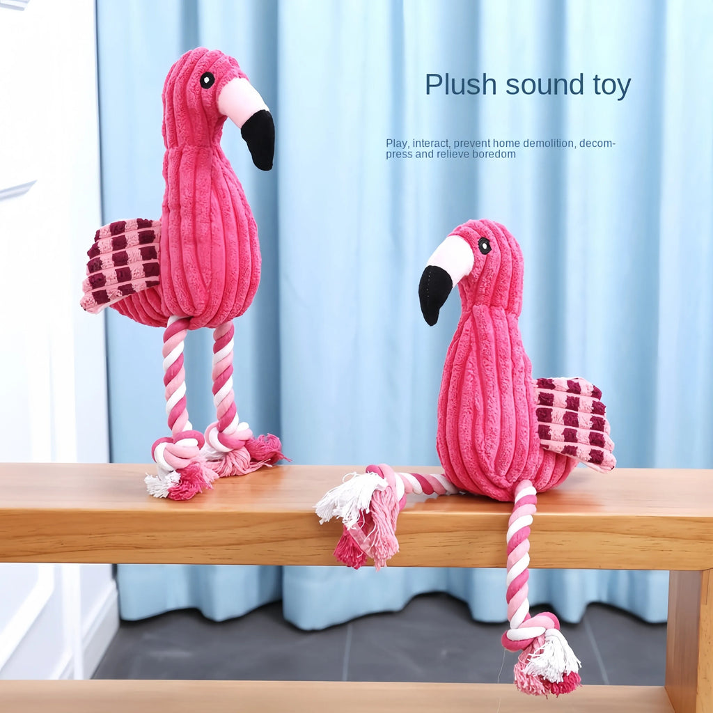 Pink animal-shaped corduroy dog toy with a squeaker inside on a white background.