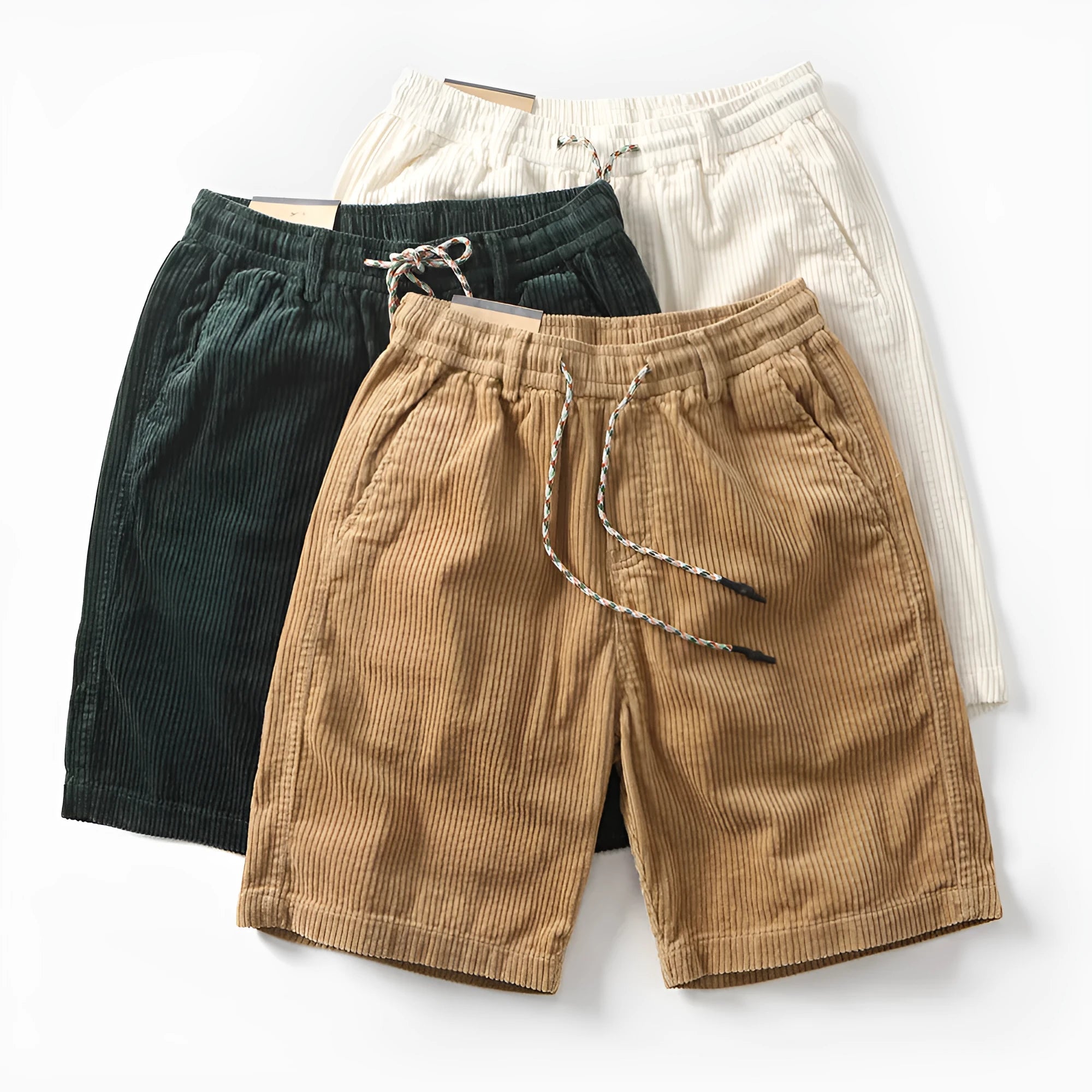 Men's khaki retro cargo shorts with a straight leg on a summer streetwear backdrop.