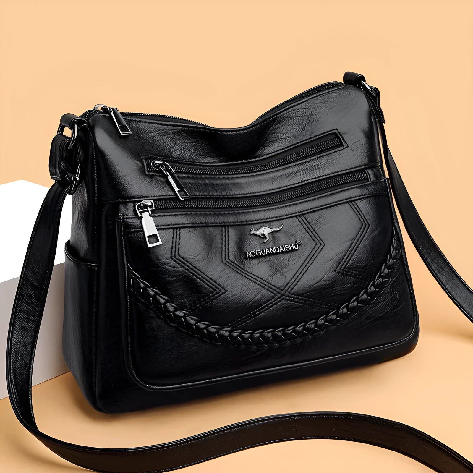 Soft PU leather crossbody shoulder bag in a horizontal square shape, shown in one of four colours: black, blue, red, or yellow.