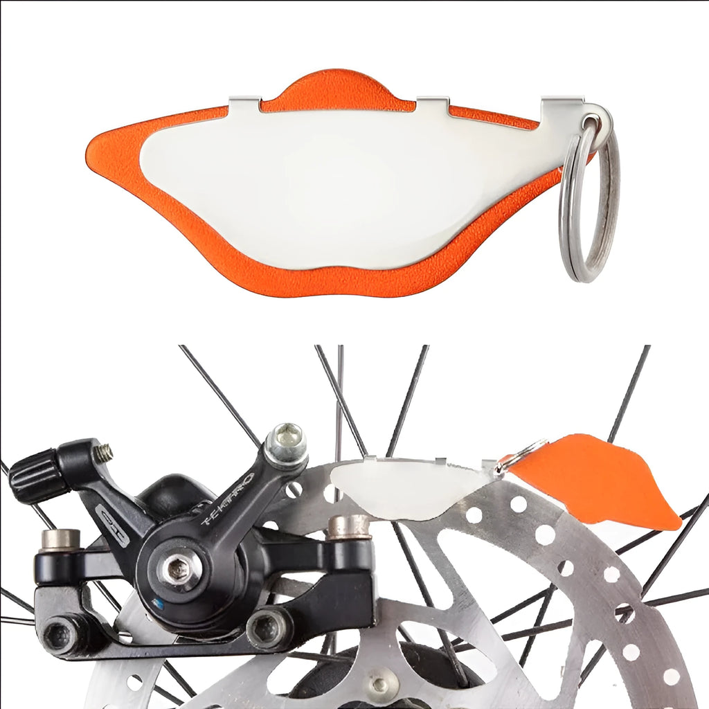Mountain bike disc brake linings in black and orange colour options, metal construction.