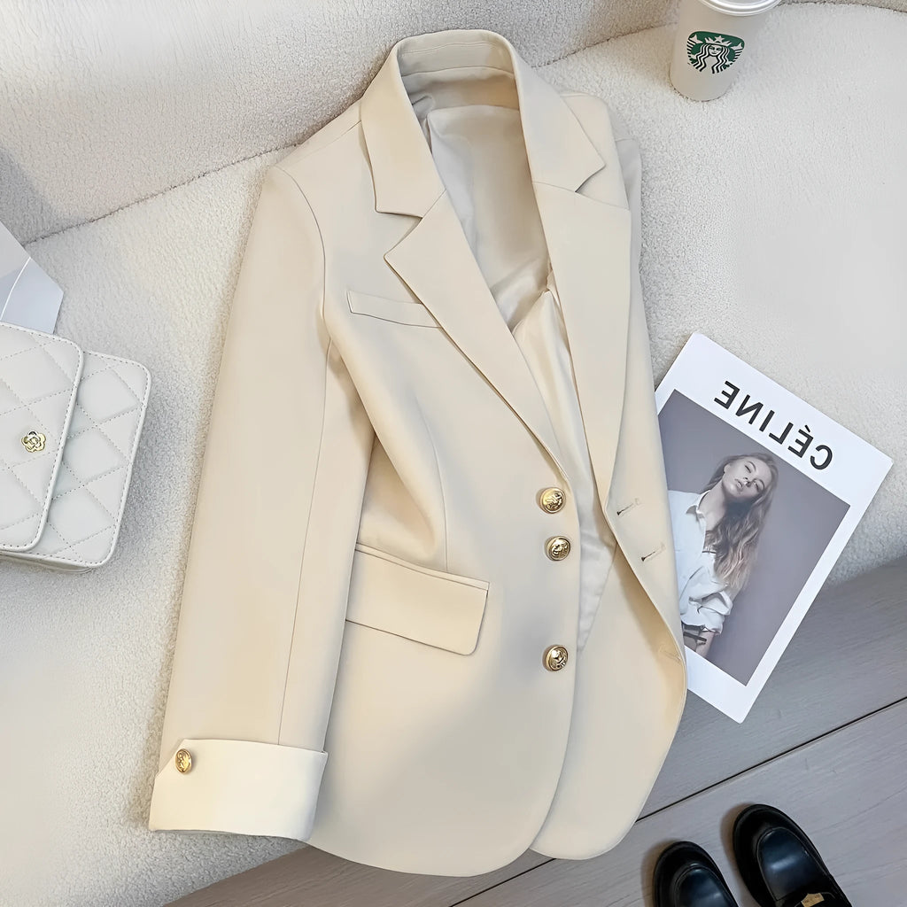 Korean style women's loose fit coat in milky white or black polyester with long sleeves and pockets