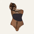 Gold handmade one-piece swimsuit with halter neck and hollow-out design on a mannequin.