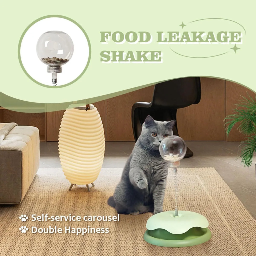 Blue and green PP plastic cat treat dispenser toy with a track ball on a textured base